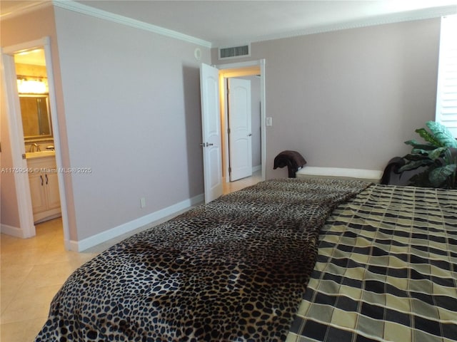 bedroom with a sink, baseboards, visible vents, crown molding, and light tile patterned floors