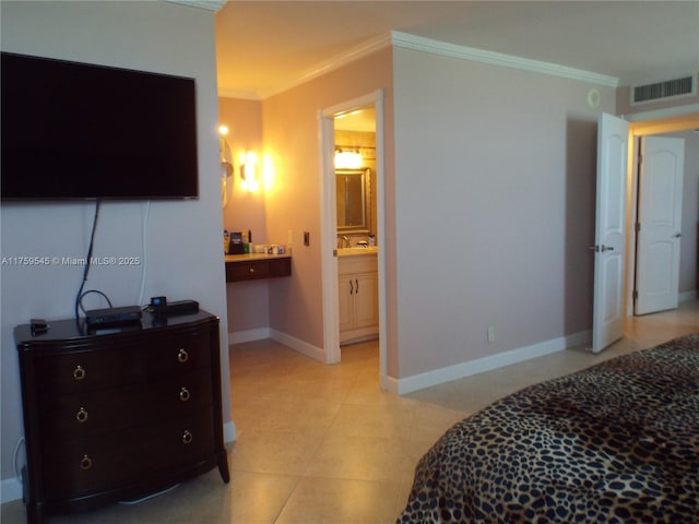 bedroom featuring ensuite bathroom, baseboards, visible vents, ornamental molding, and light tile patterned floors