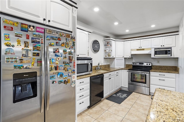 kitchen with under cabinet range hood, a sink, white cabinets, appliances with stainless steel finishes, and open shelves