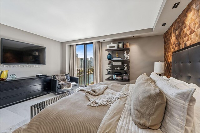 19667 Turnberry Way Unit 8K, Aventura, FL 33180 - bedroom featuring access to exterior and carpet