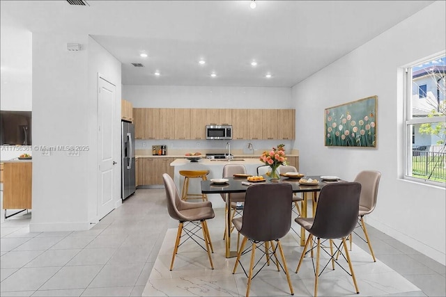 dining area with recessed lighting, light tile patterned floors, baseboards, and visible vents