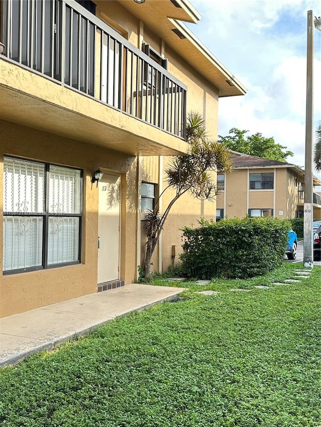 exterior space with a balcony