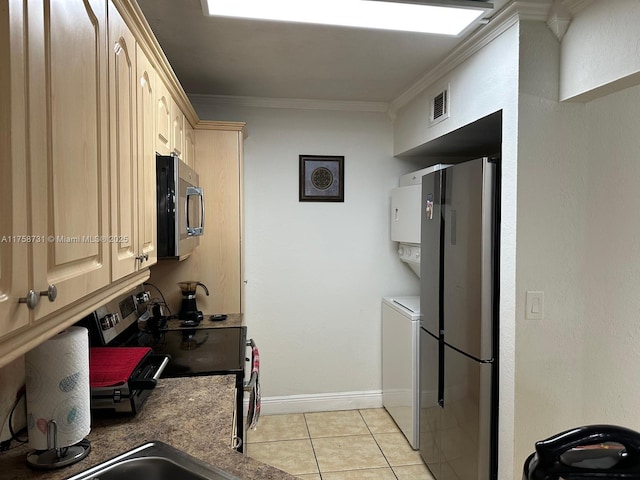 kitchen with light tile patterned floors, baseboards, visible vents, appliances with stainless steel finishes, and crown molding