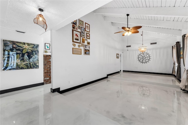 interior space with vaulted ceiling with beams, visible vents, a ceiling fan, wooden ceiling, and baseboards