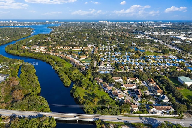 drone / aerial view featuring a water view