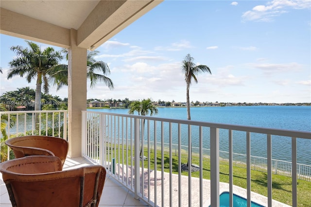 balcony featuring a water view