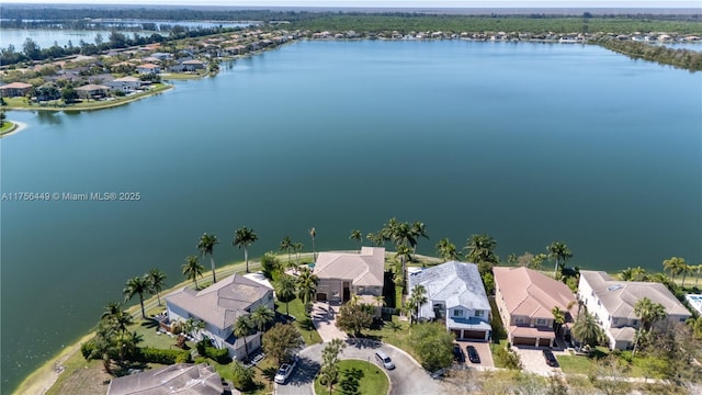 aerial view featuring a residential view and a water view