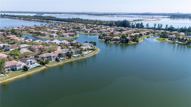 birds eye view of property with a residential view and a water view