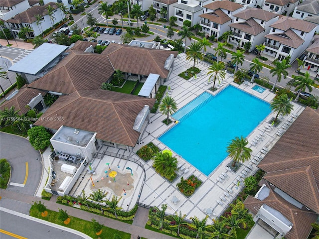 birds eye view of property with a residential view