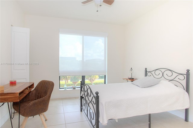 bedroom featuring light tile patterned floors and ceiling fan