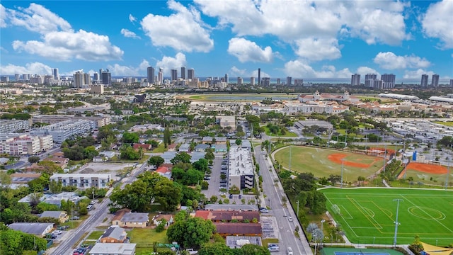 birds eye view of property featuring a city view