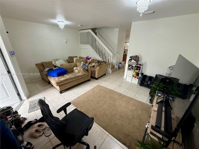 tiled living room with visible vents and stairway