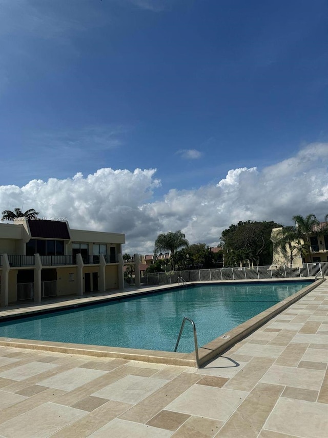 pool featuring fence