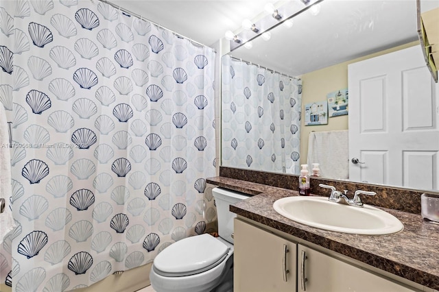 full bath with toilet, a shower with shower curtain, and vanity