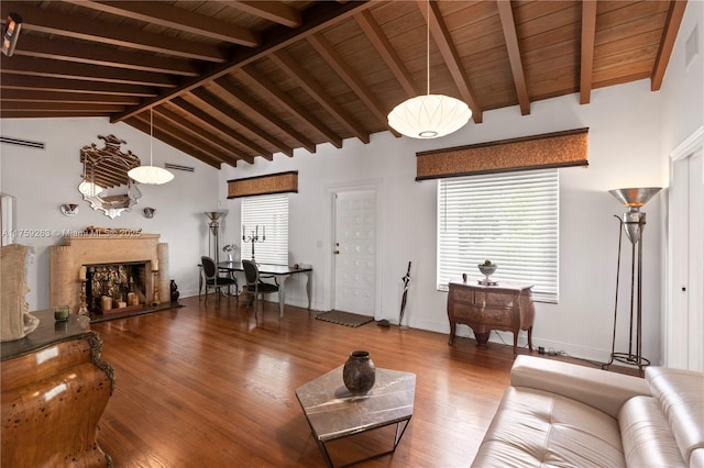 living area with baseboards, visible vents, wood ceiling, wood finished floors, and a fireplace