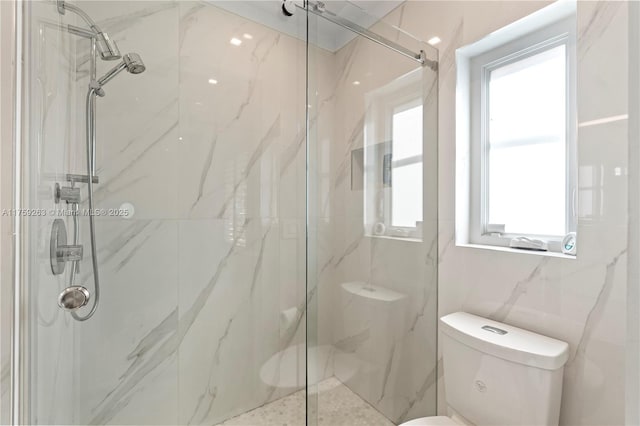 full bath featuring toilet and a marble finish shower