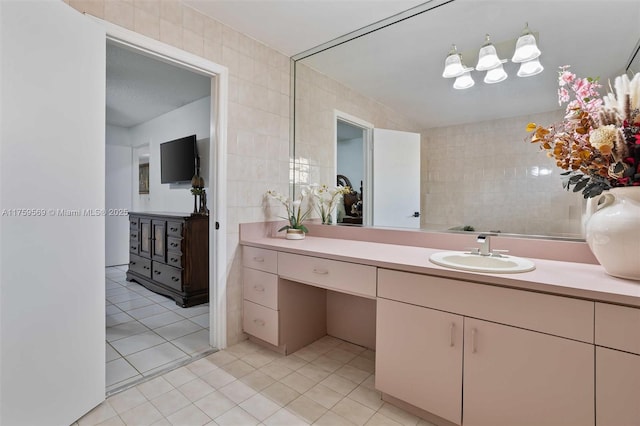 7801 SW 9th Ter, Miami, FL 33144 - bathroom with vanity, tile patterned flooring, and tile walls