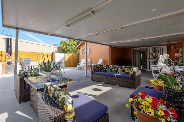 7801 SW 9th Ter, Miami, FL 33144 - view of patio / terrace featuring an outdoor living space and fence