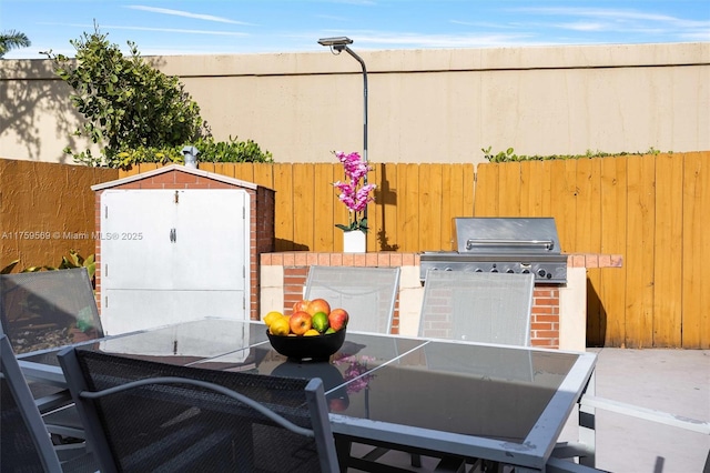 7801 SW 9th Ter, Miami, FL 33144 - view of patio with fence, outdoor dining space, and grilling area