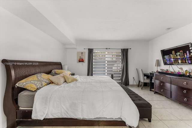 bedroom featuring light tile patterned floors