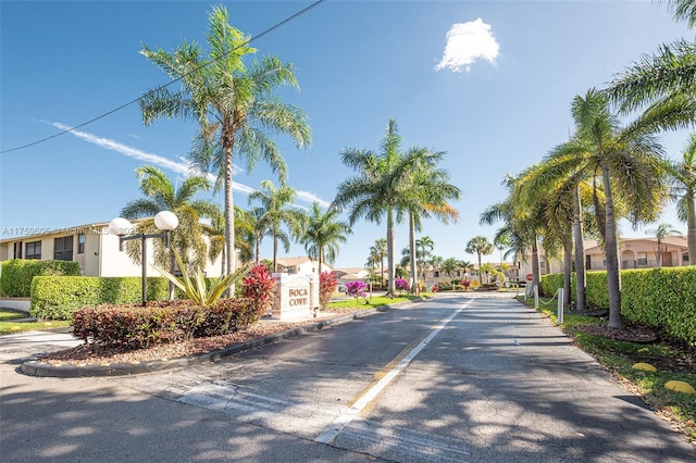 view of street featuring traffic signs and a residential view