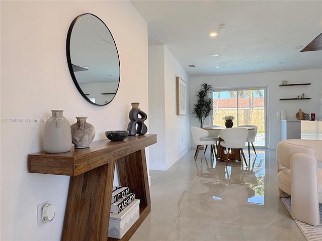 dining room featuring recessed lighting, visible vents, baseboards, and a textured ceiling