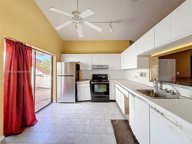 kitchen with electric range, under cabinet range hood, a sink, freestanding refrigerator, and dishwasher