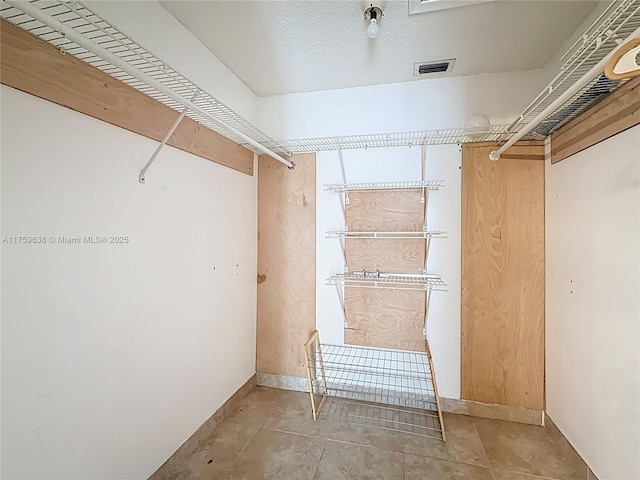 spacious closet with visible vents