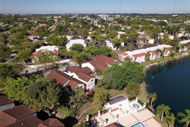 bird's eye view featuring a residential view and a water view