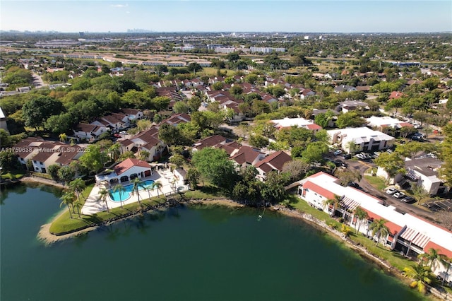 bird's eye view featuring a residential view and a water view