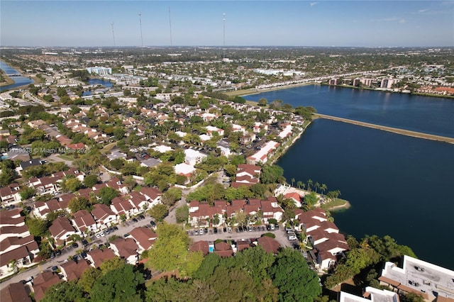 bird's eye view with a water view and a residential view