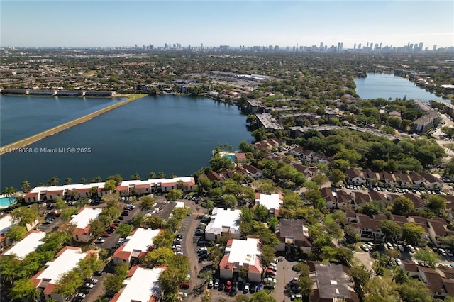 bird's eye view with a view of city and a water view