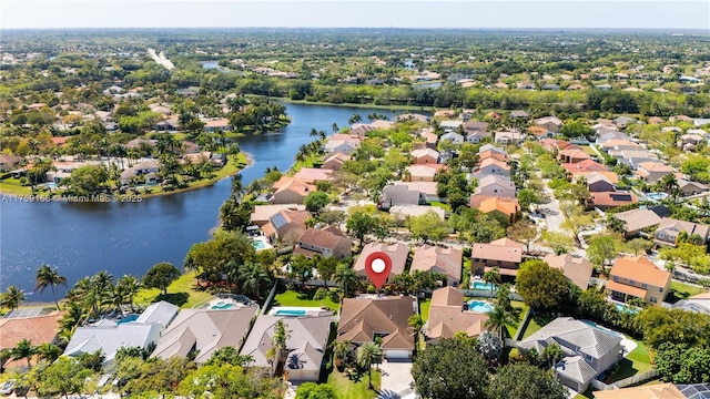 aerial view with a water view and a residential view