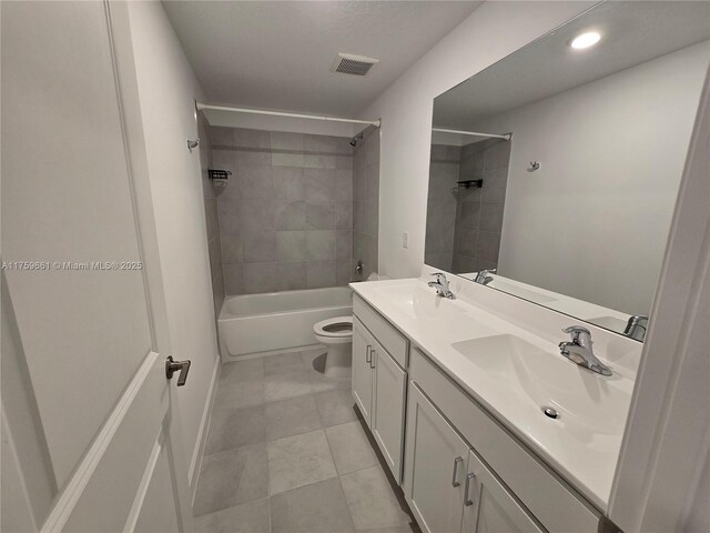 6001 Woods Edge Cir, Riviera Beach, FL 33410 - bathroom with double vanity, tub / shower combination, tile patterned floors, and recessed lighting