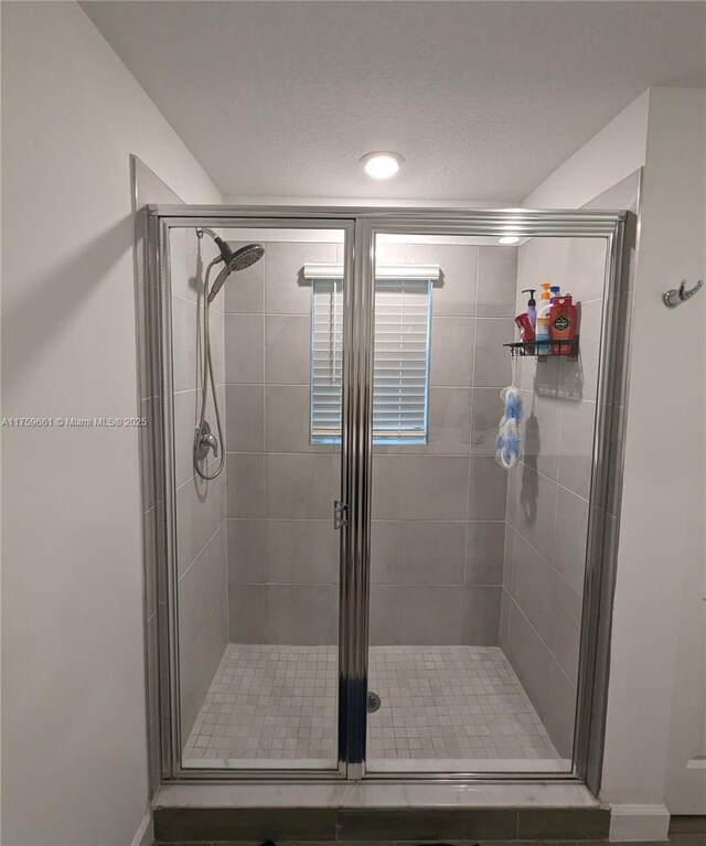 6001 Woods Edge Cir, Riviera Beach, FL 33410 - full bathroom with a stall shower and baseboards