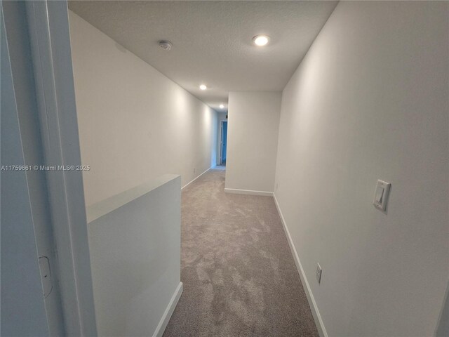 6001 Woods Edge Cir, Riviera Beach, FL 33410 - hall with light carpet and recessed lighting