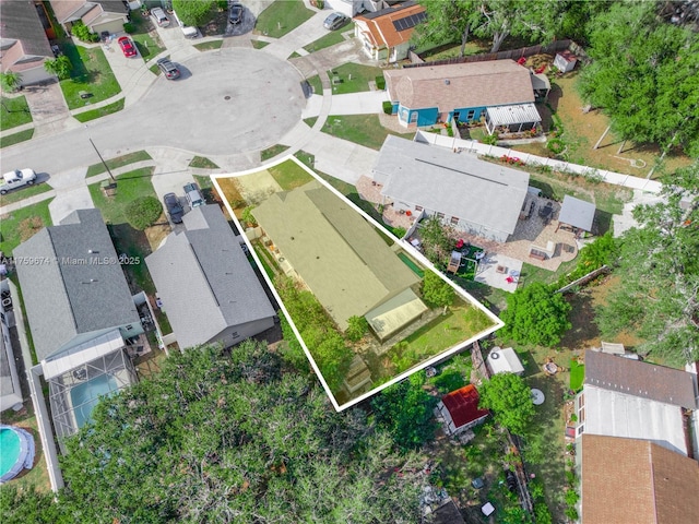 birds eye view of property with a residential view