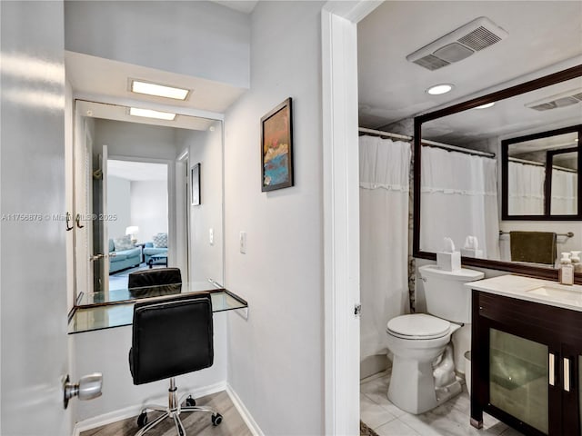 bathroom featuring visible vents, toilet, vanity, a shower with curtain, and baseboards