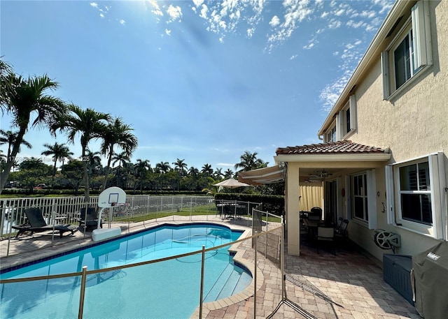 view of pool featuring a fenced in pool, a patio, and fence