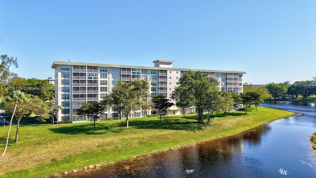 view of building exterior featuring a water view