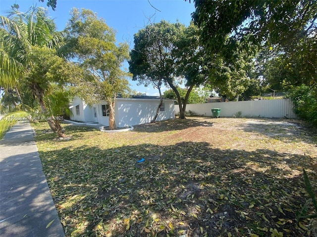 view of yard featuring fence