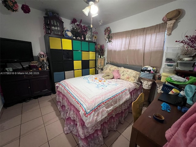 bedroom featuring light tile patterned flooring