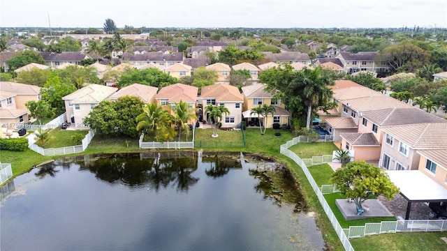 aerial view featuring a water view and a residential view