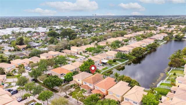 aerial view featuring a water view and a residential view