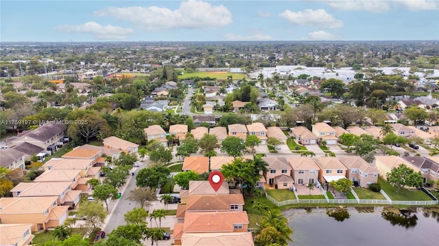 aerial view with a residential view and a water view