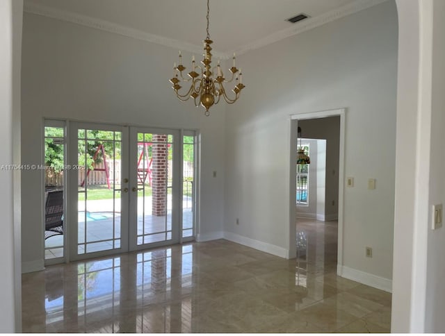 unfurnished room featuring marble finish floor, visible vents, baseboards, and french doors