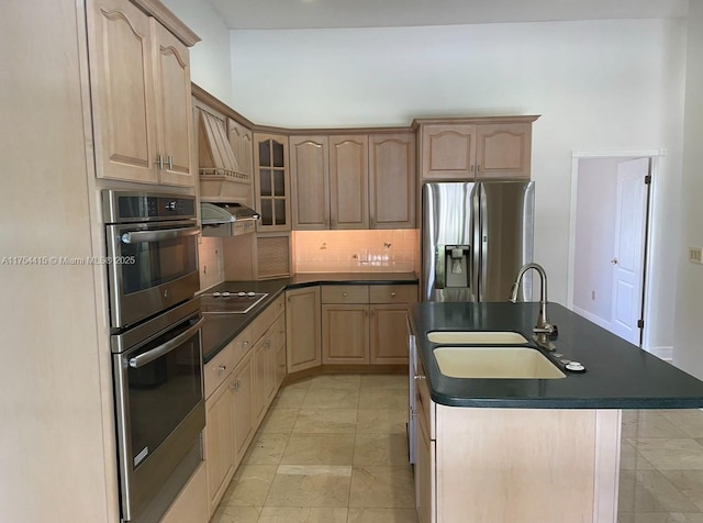 15030 SW 89th Ave, Palmetto Bay, FL 33176 - kitchen with light brown cabinets, an island with sink, a sink, appliances with stainless steel finishes, and dark countertops
