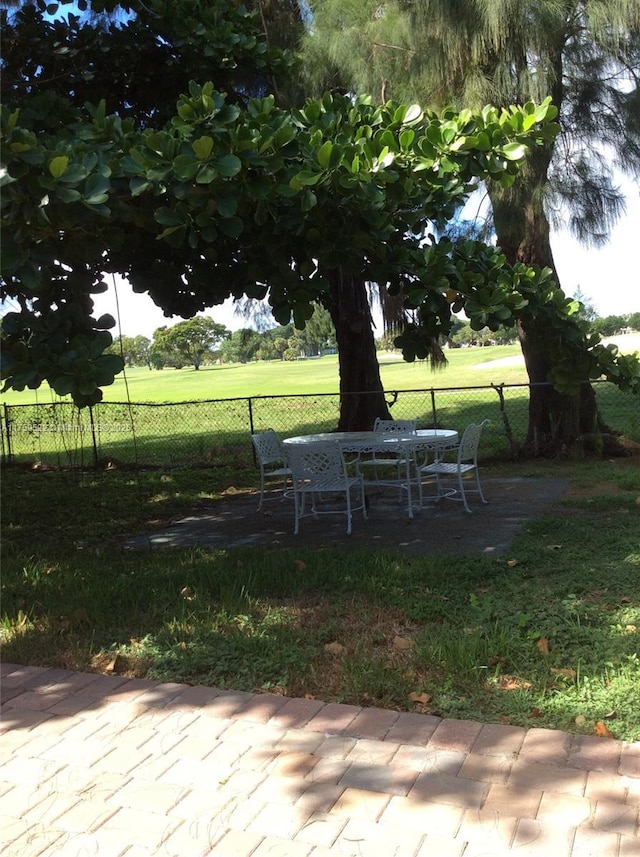 view of yard with a patio and fence