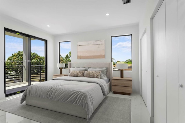 bedroom featuring access to outside and recessed lighting