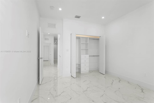 unfurnished bedroom featuring marble finish floor, visible vents, and recessed lighting